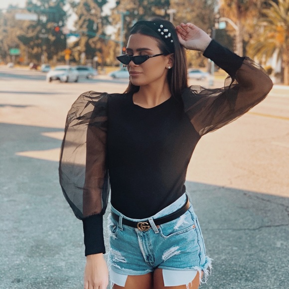 black shirt with sheer puff sleeves